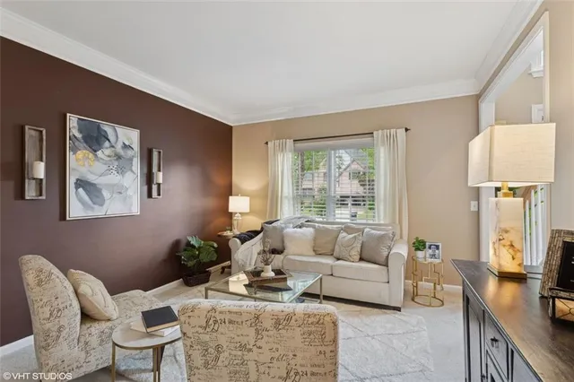 a bed room with a bed and a chandelier