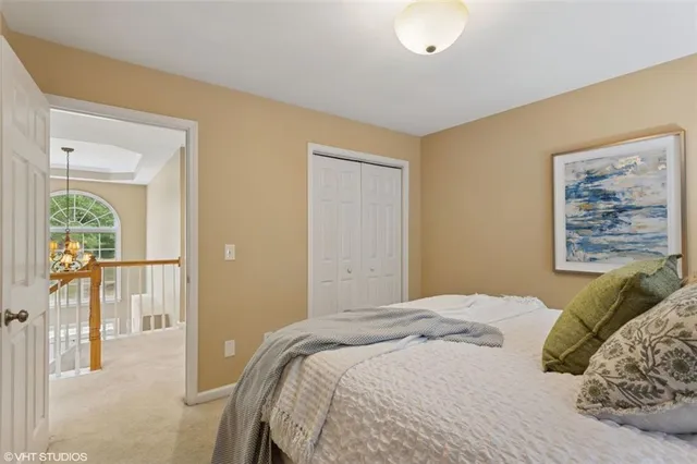 a bathroom with a double vanity sink toilet and shower