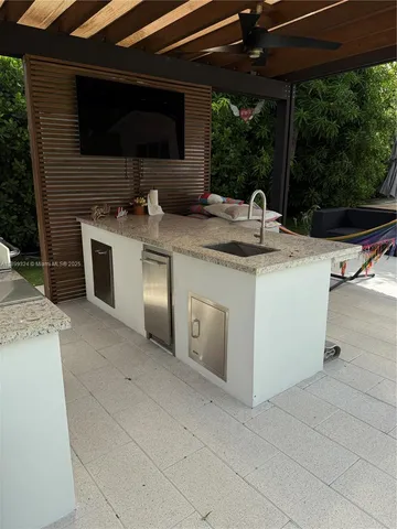 a view of backyard with green space