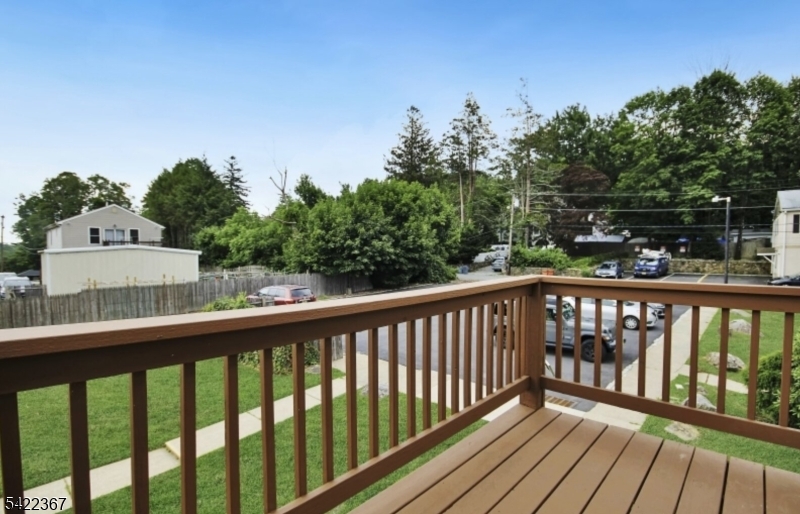 3 Prospect Street, Unit 2D Mount Arlington, NJ 07856 - Photo 12 of 20 a view of balcony with wooden floor and fence