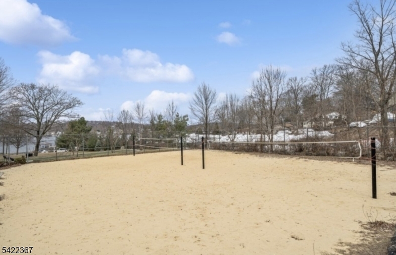 3 Prospect Street, Unit 2D Mount Arlington, NJ 07856 - Photo 15 of 20 a view of pool and snow in the background