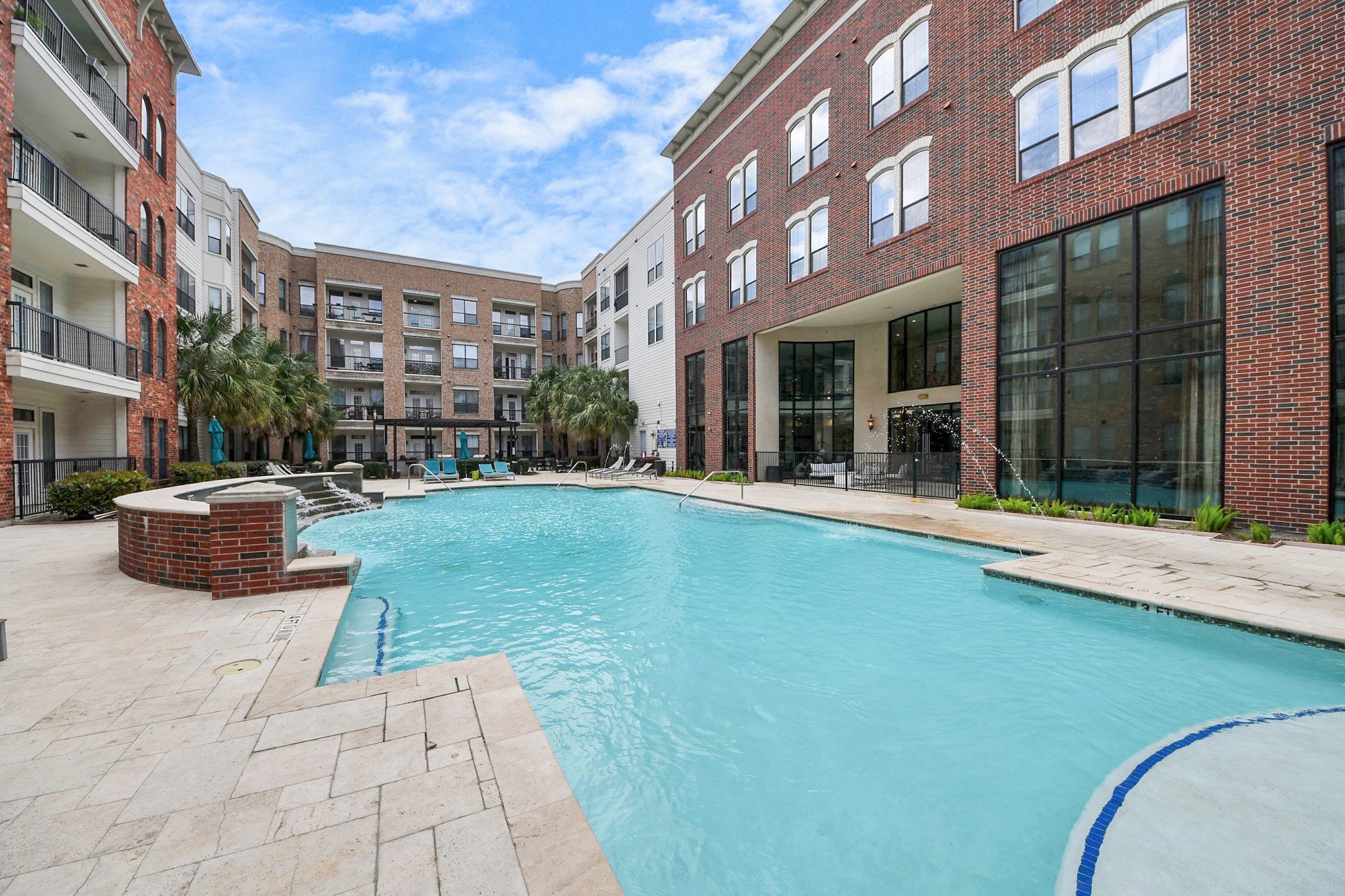 6363 San Felipe Street, Unit 243 Houston, TX 77057 - Photo 34 of 43 a view of a building with a yard