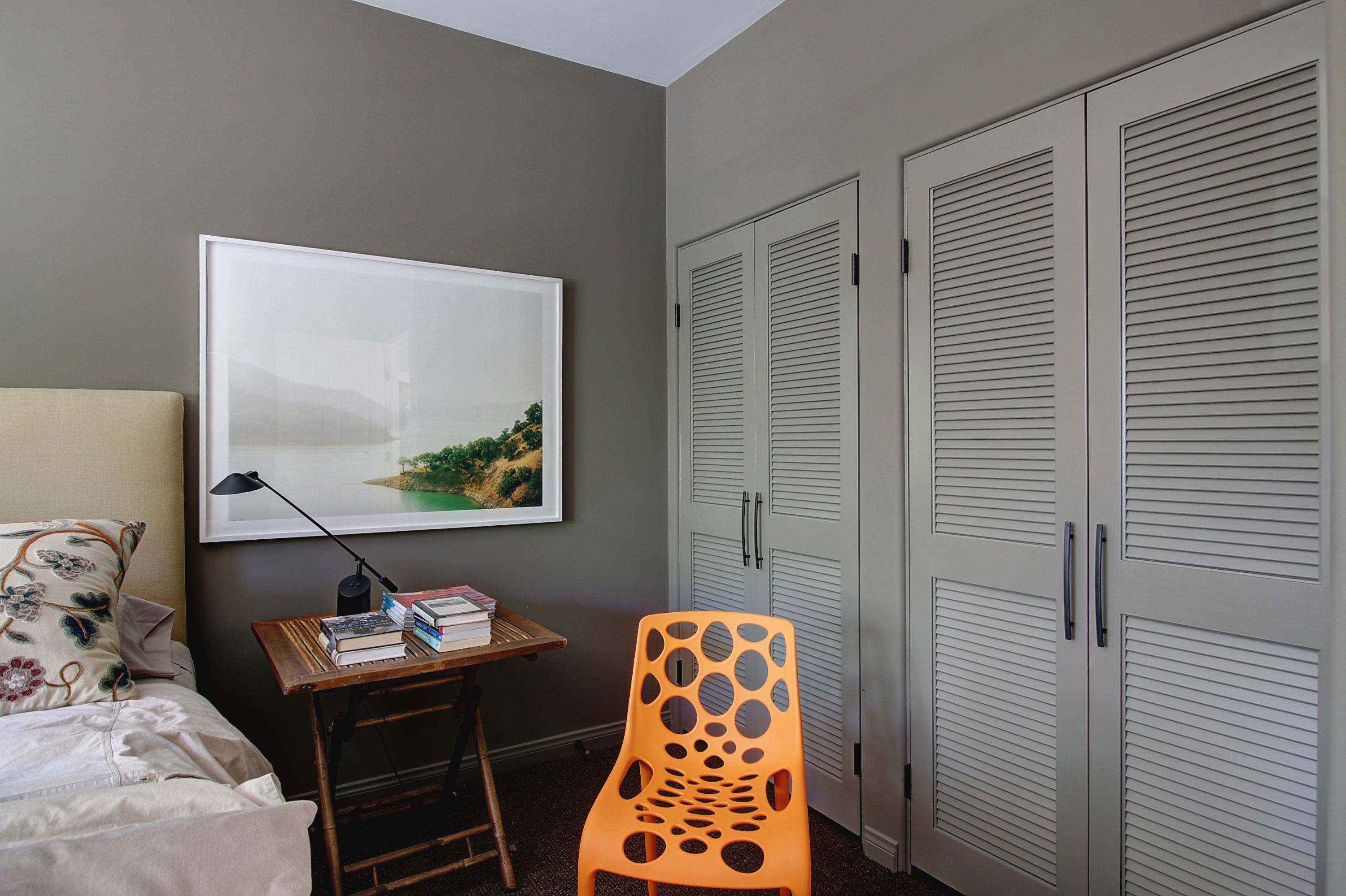 71 Olive Mill Road Montecito, CA 93108 - Photo 15 of 22 a bedroom with a bed and a wall painting