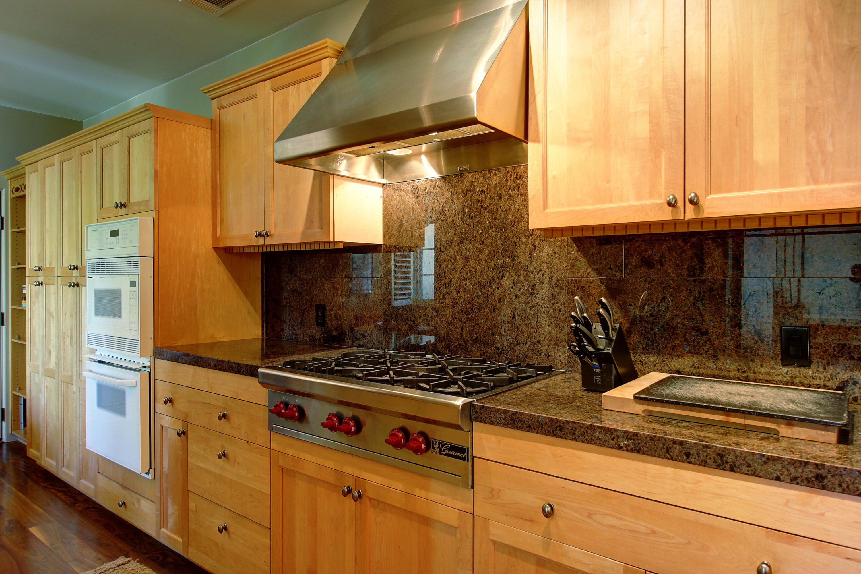 71 Olive Mill Road Montecito, CA 93108 - Photo 7 of 22 a kitchen with stainless steel appliances granite countertop a stove and a refrigerator