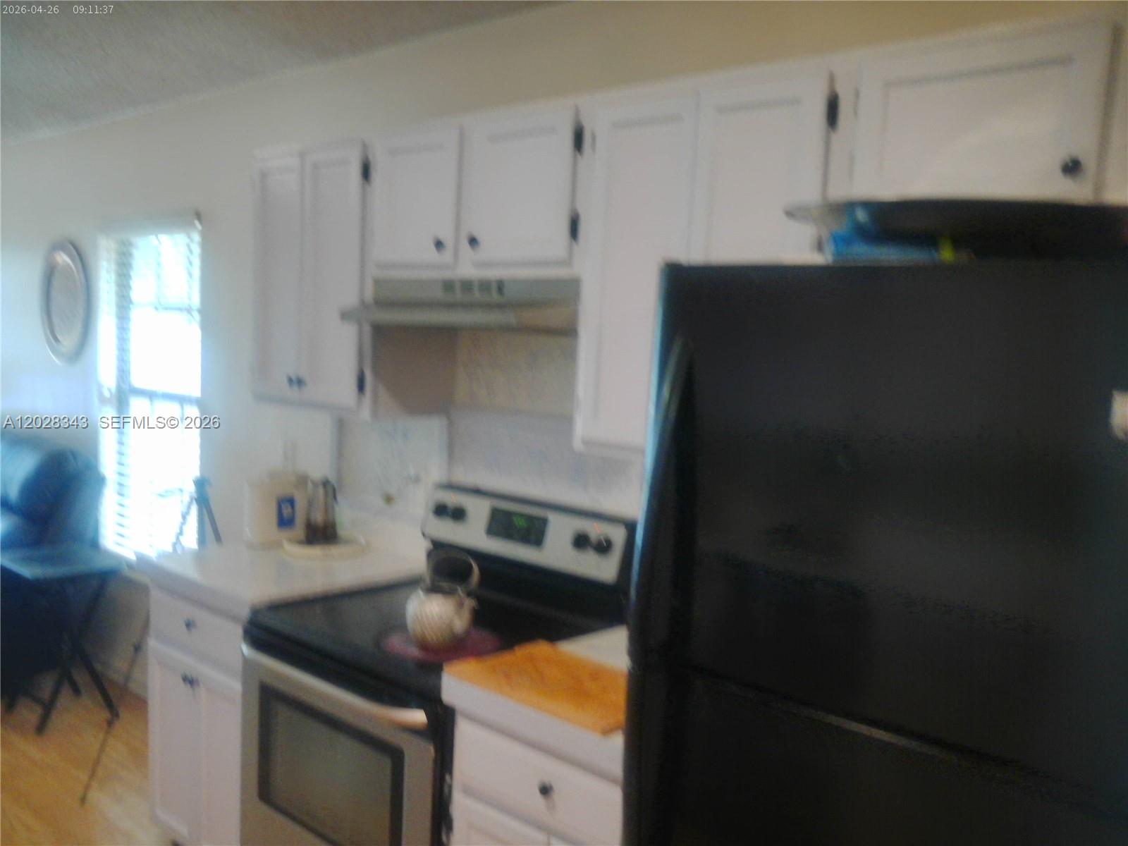 1641 Spring Oaks Lane Jacksonville, FL 32221 - Photo 25 of 44 a kitchen with a sink and cabinets