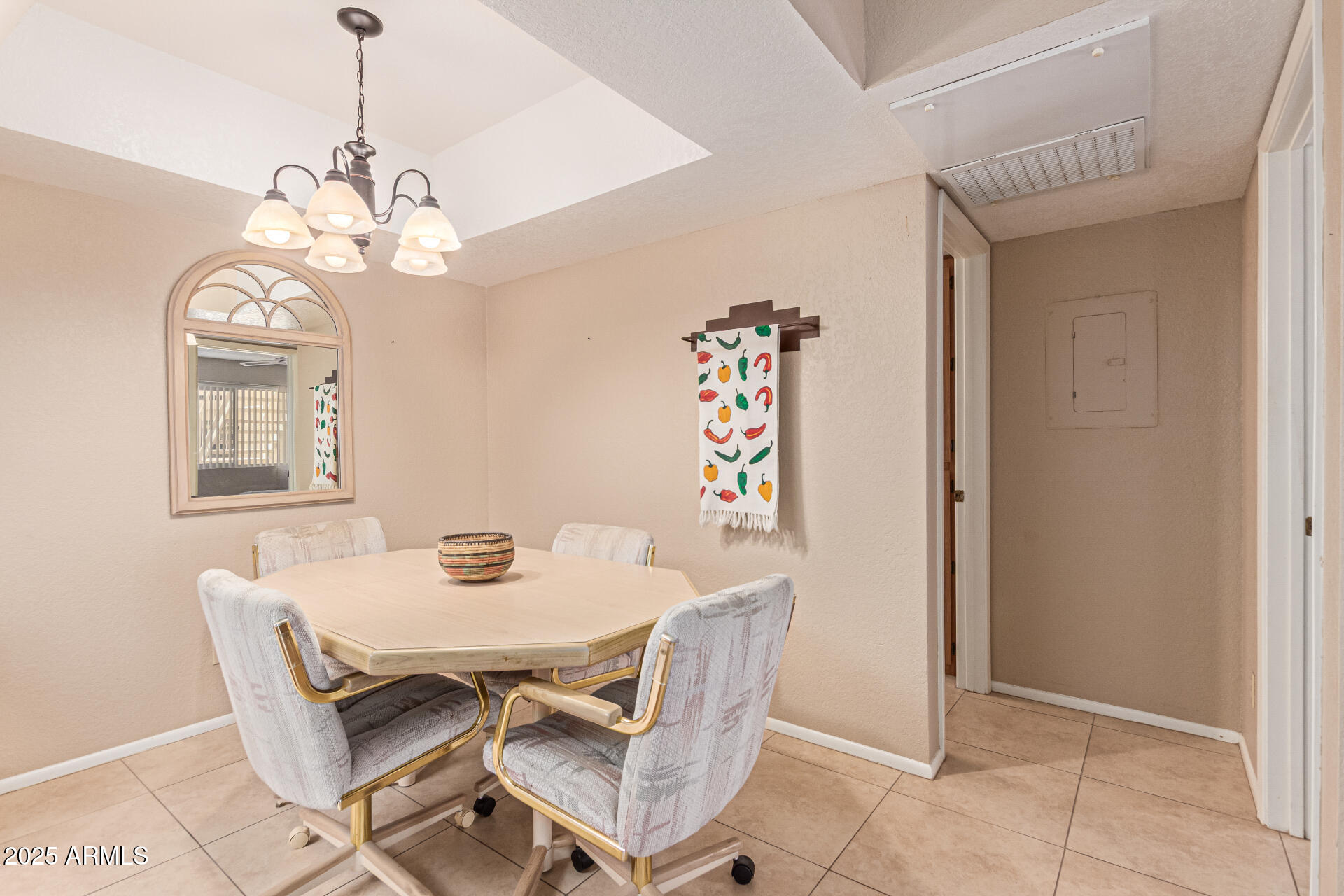 145 North 74th Street, Unit 127 Mesa, AZ 85207 - Photo 11 of 34 a dining room with furniture and window