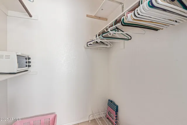 a bathroom with a shower a toilet and a shower