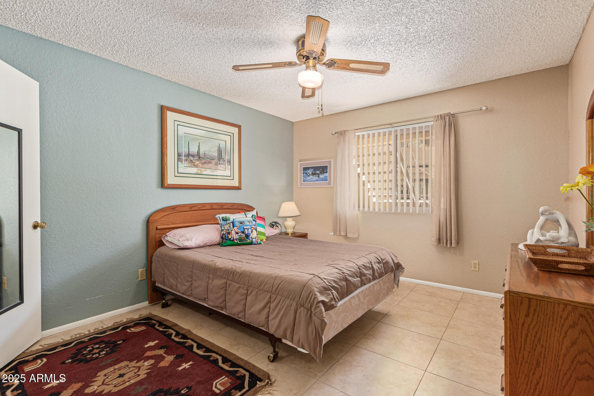 145 North 74th Street, Unit 127 Mesa, AZ 85207 - Photo 21 of 34 a bedroom with a bed and a window