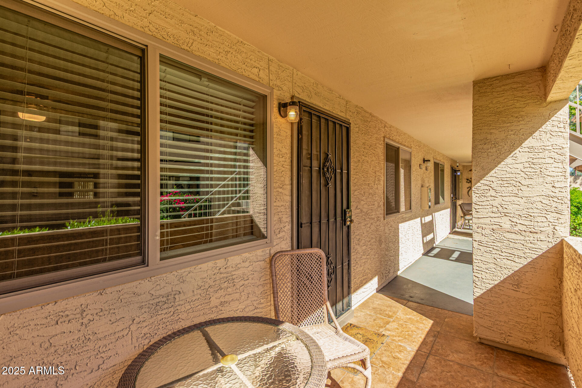 145 North 74th Street, Unit 127 Mesa, AZ 85207 - Photo 4 of 34 a view of balcony with couch