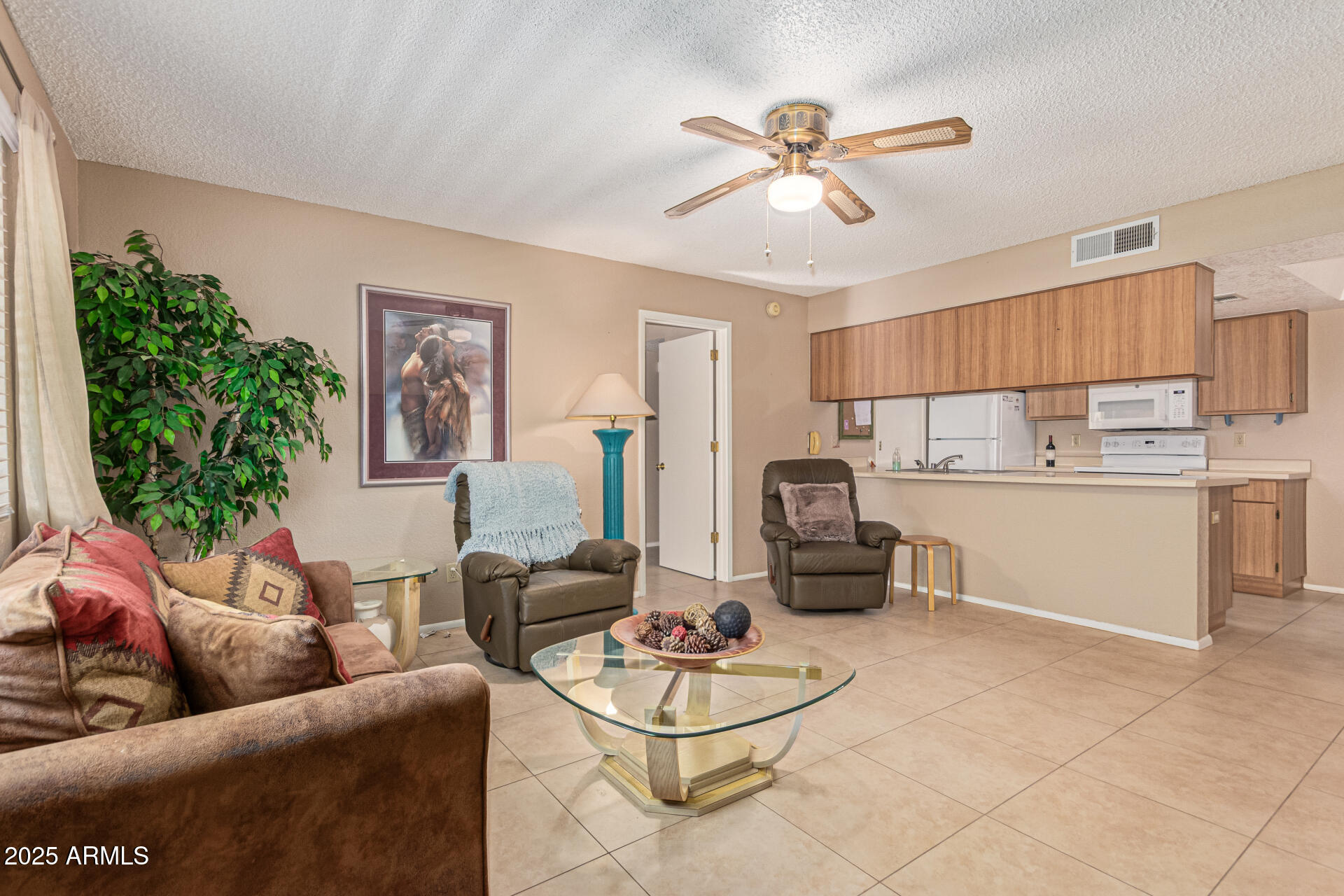 145 North 74th Street, Unit 127 Mesa, AZ 85207 - Photo 8 of 34 a living room with furniture