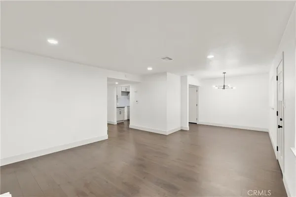 an empty room with a bathroom