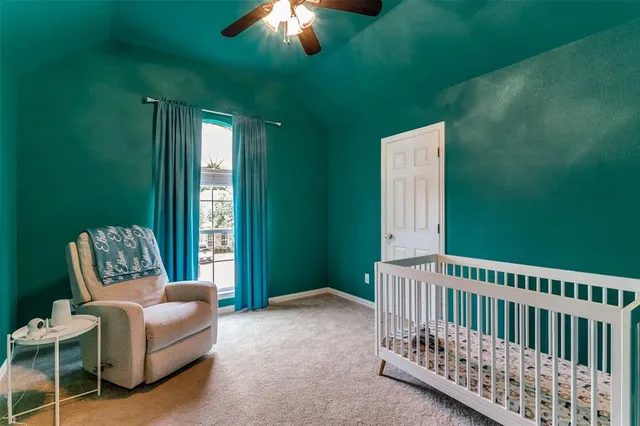 a view of a balcony with furniture and a chandelier