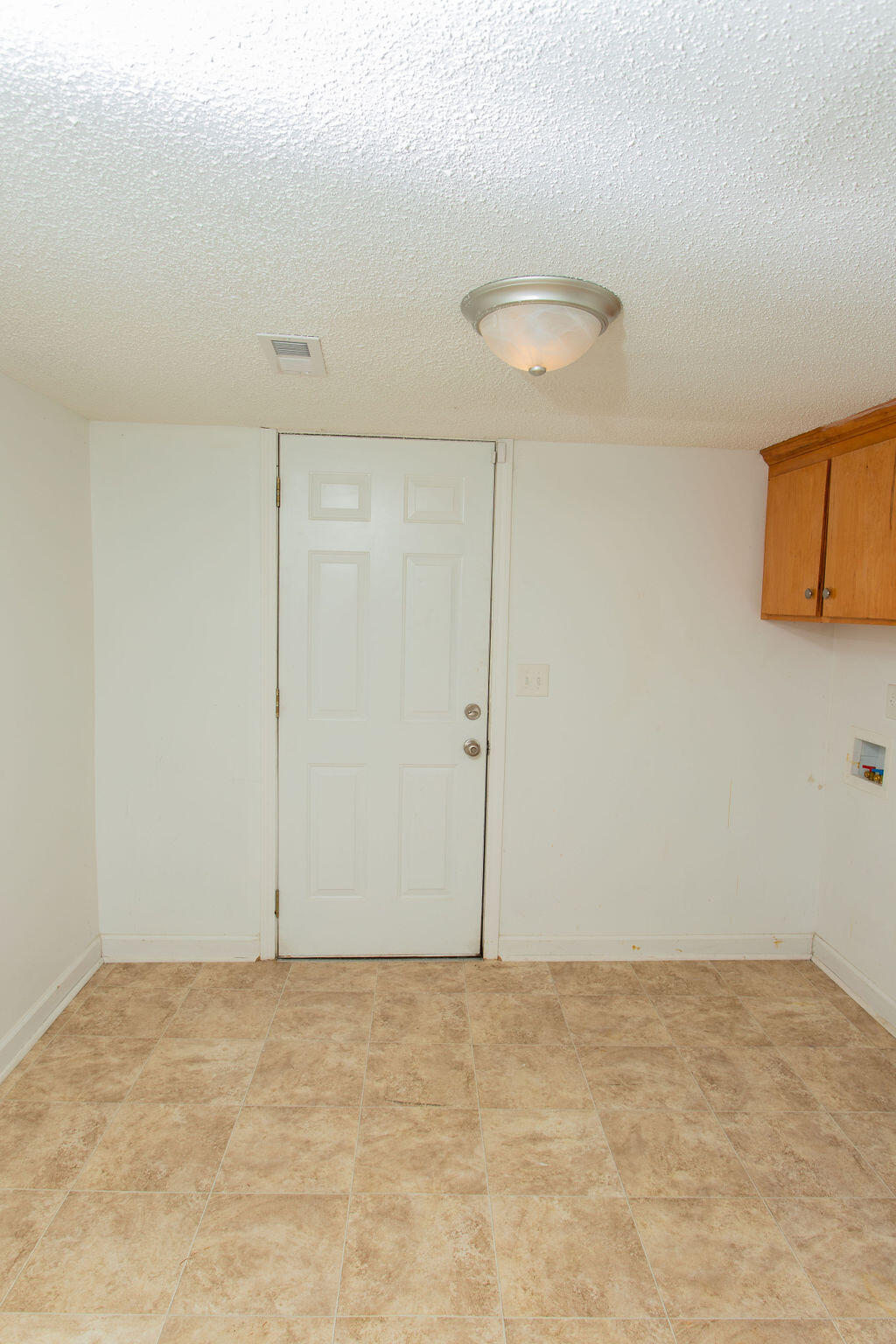 4741 Narrow Paved Road Lynchburg, SC 29080 - Photo 7 of 15 Laundry/utility area, can be closed off from the rest of the house. Back door.