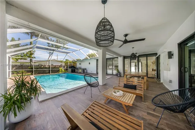 a view of a livingroom with furniture and window