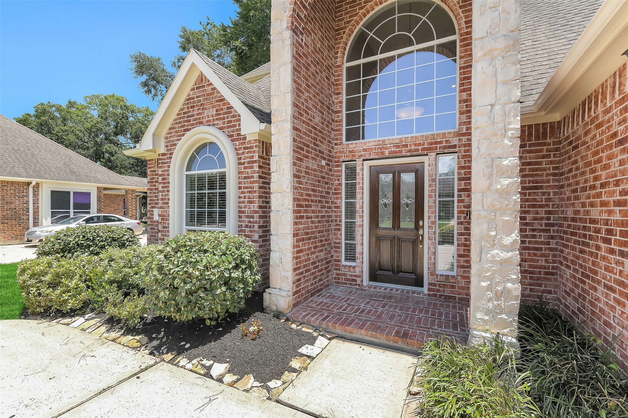 Welcoming entry with covered front porch ~