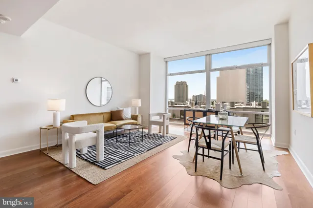 a bedroom with a bed and a lamp