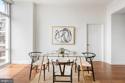a living room with a rug