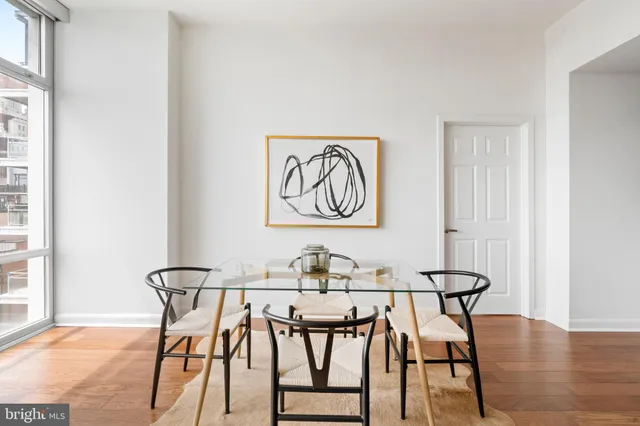 a living room with a rug