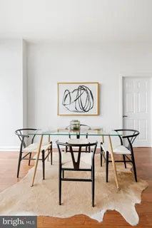 a kitchen with a window kitchen counter and view living room