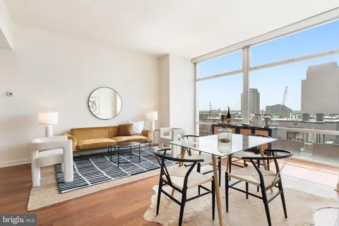 an empty room with wooden floor