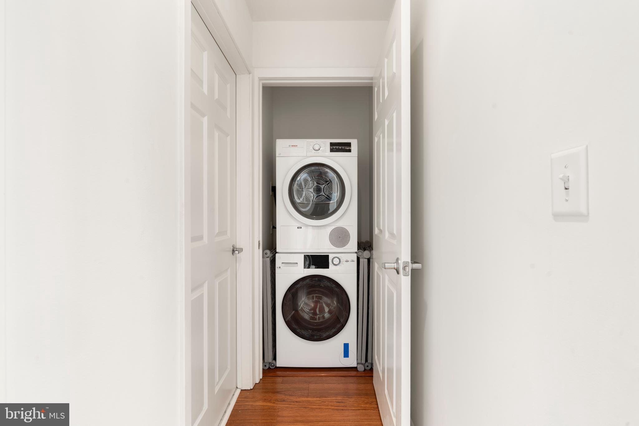 22 South Front Street, Unit 603 Philadelphia, PA 19106 - Photo 30 of 44 a utility room with dryer and washer
