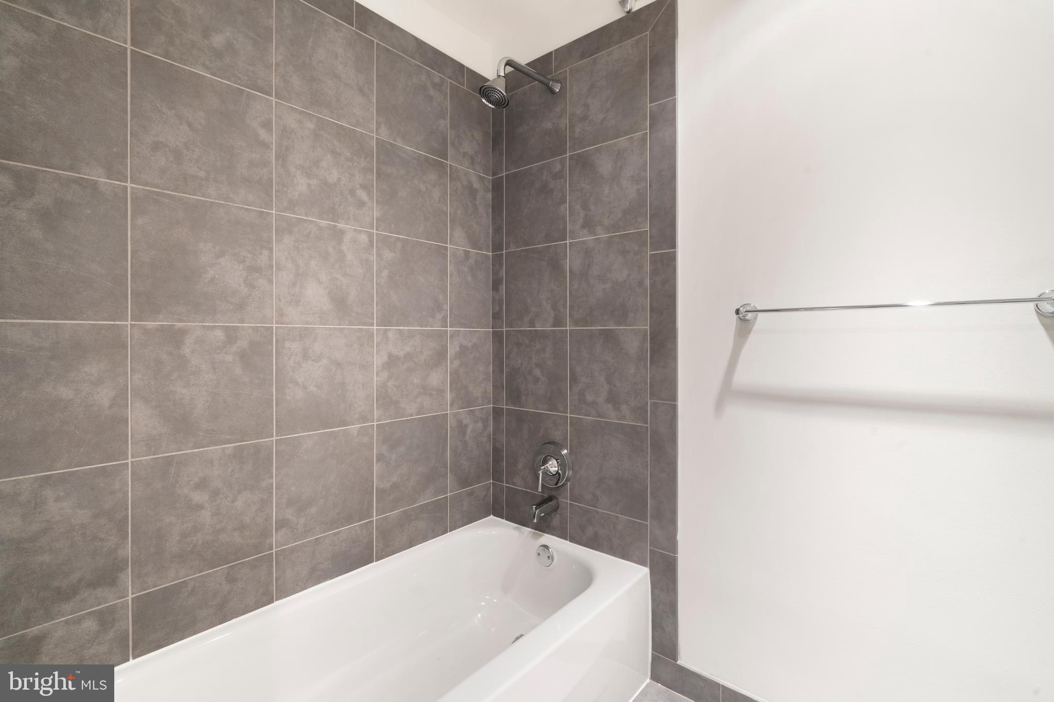 22 South Front Street, Unit 603 Philadelphia, PA 19106 - Photo 33 of 44 a bathroom with a bathtub