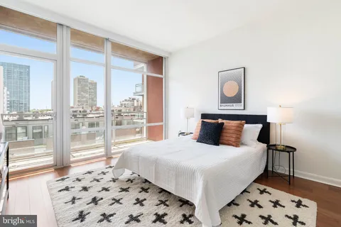a bathroom with a sink a washer and dryer