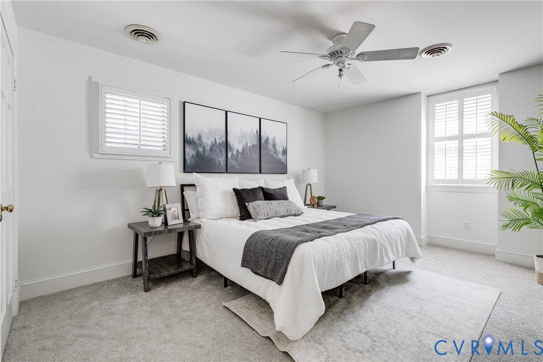 509 Wadeward Road Henrico, VA 23229 - Photo 33 of 59 a spacious bedroom with a bed and window