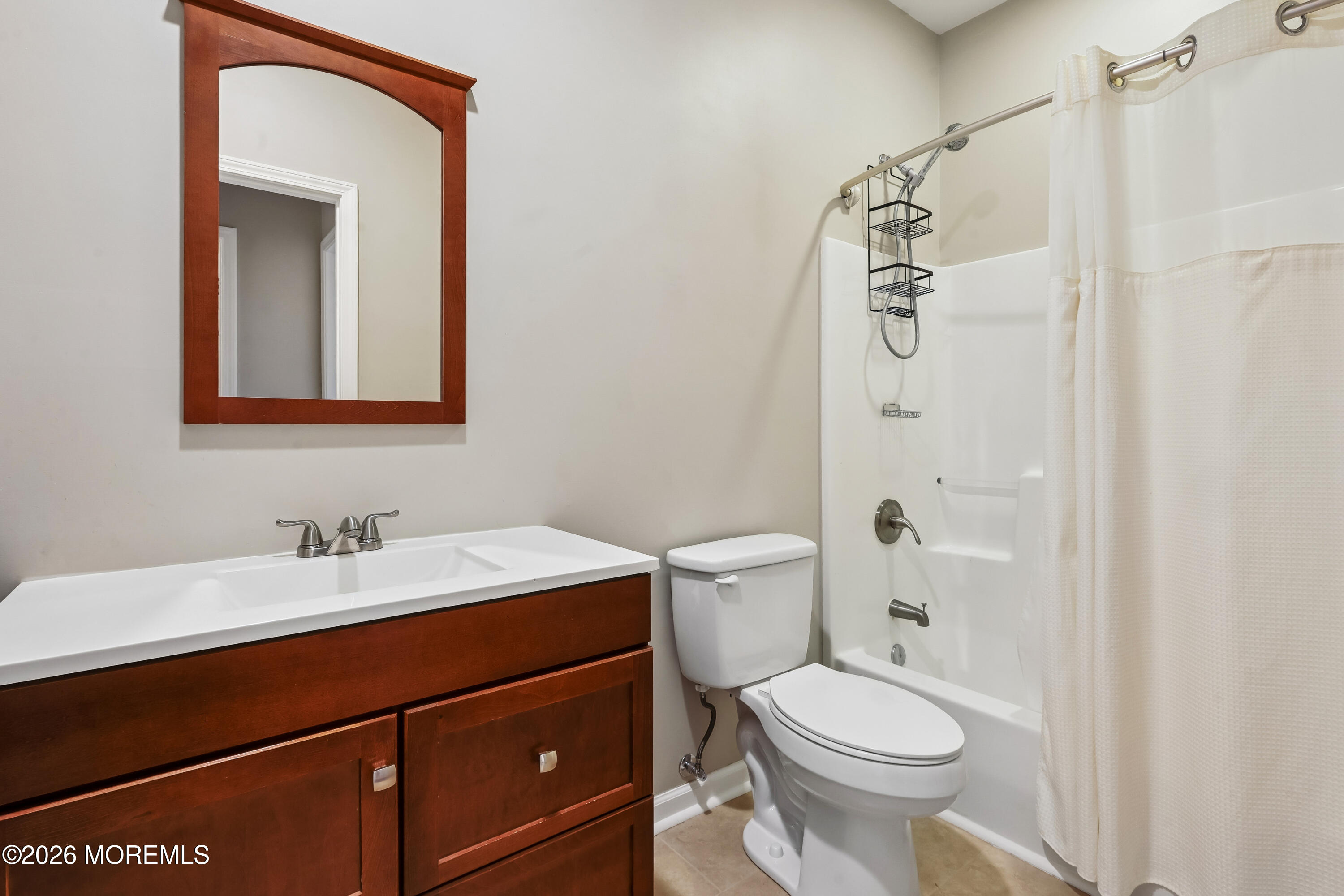 66 Sandpiper Road Barnegat, NJ 08005 - Photo 14 of 25 a bathroom with a sink a toilet and shower