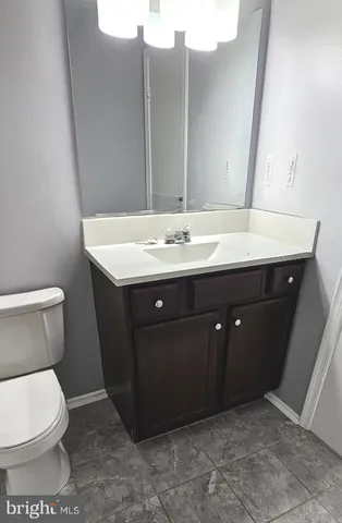 a bathroom with a sink and a toilet