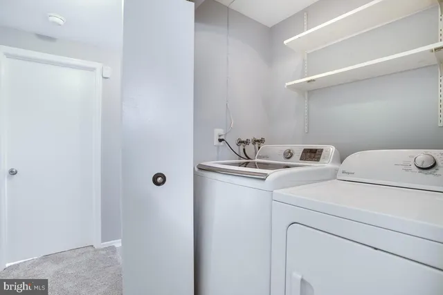 a view of a backyard with a small cabin