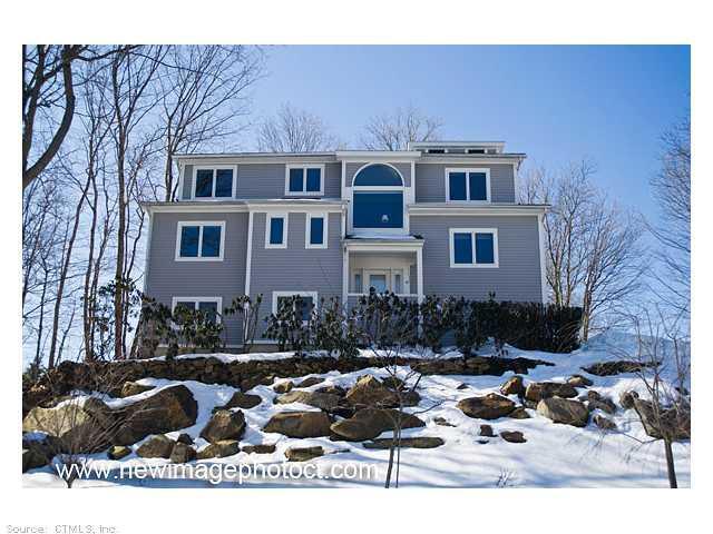 41 Old Smugglers Road Branford, CT 06405 - Photo 1 of 1 a front view of house with yard outdoor seating and barbeque oven