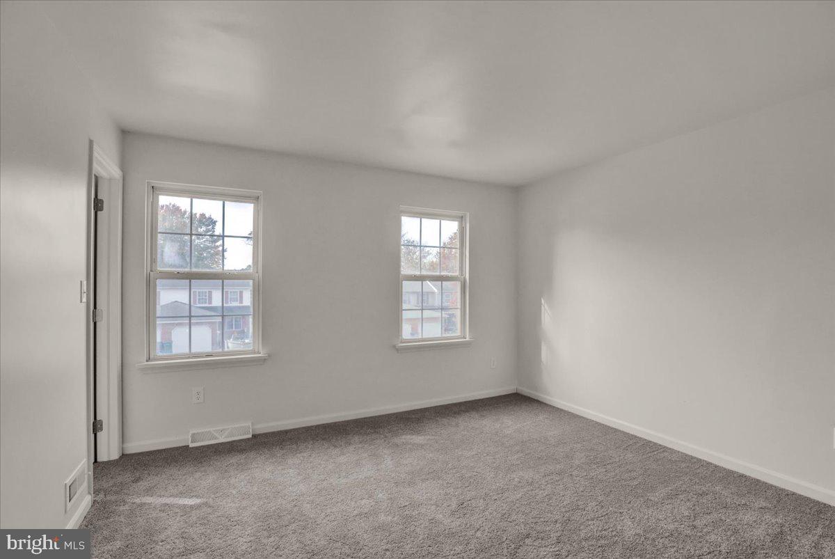 407 Groffdale Road Quarryville, PA 17566 - Photo 21 of 29 an empty room with windows