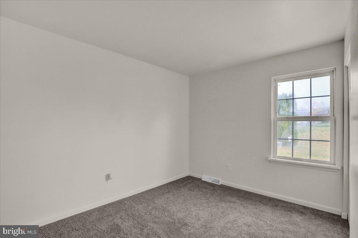 407 Groffdale Road Quarryville, PA 17566 - Photo 25 of 29 an empty room with a window