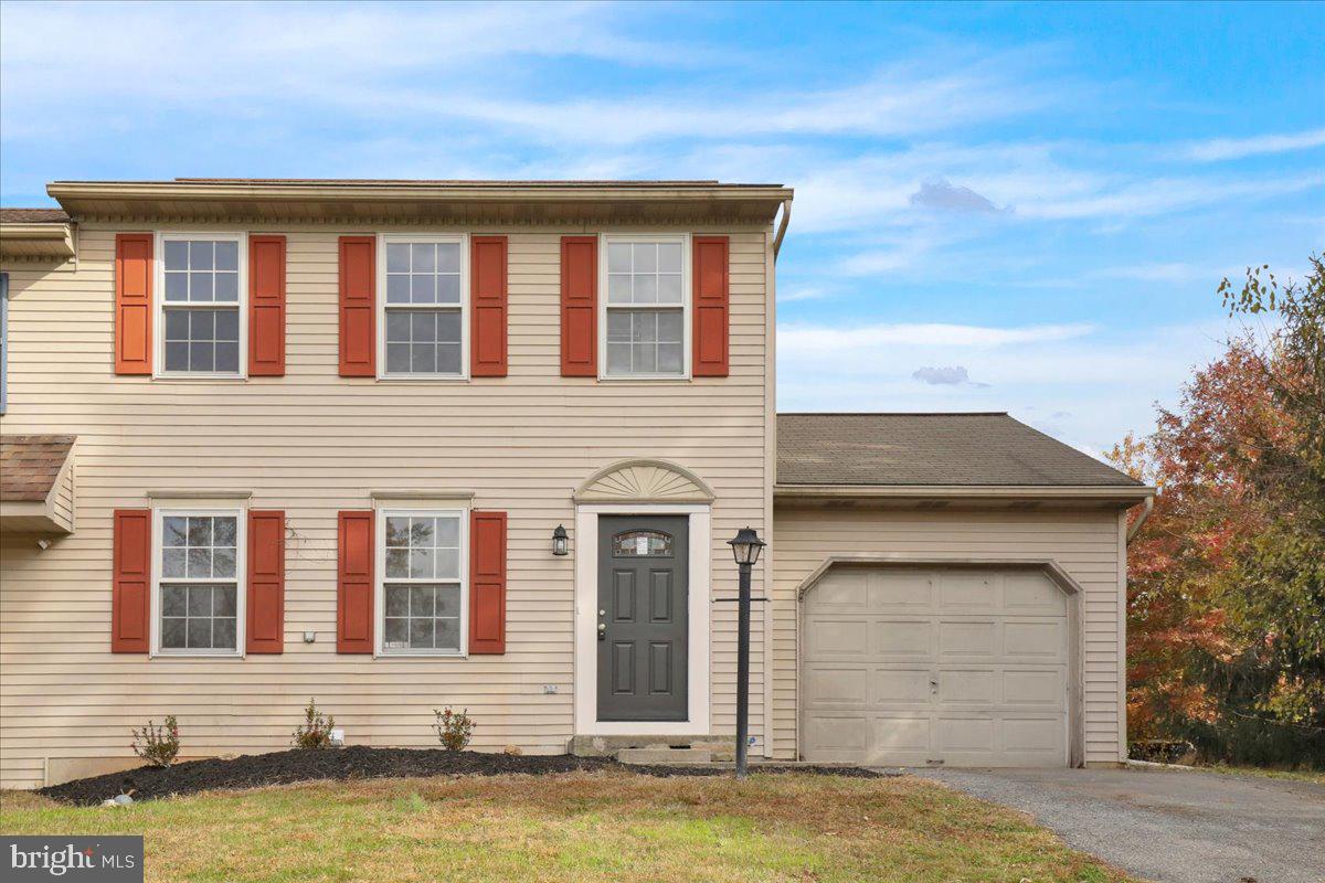 407 Groffdale Road Quarryville, PA 17566 - Photo 3 of 29 a front view of a house with a yard