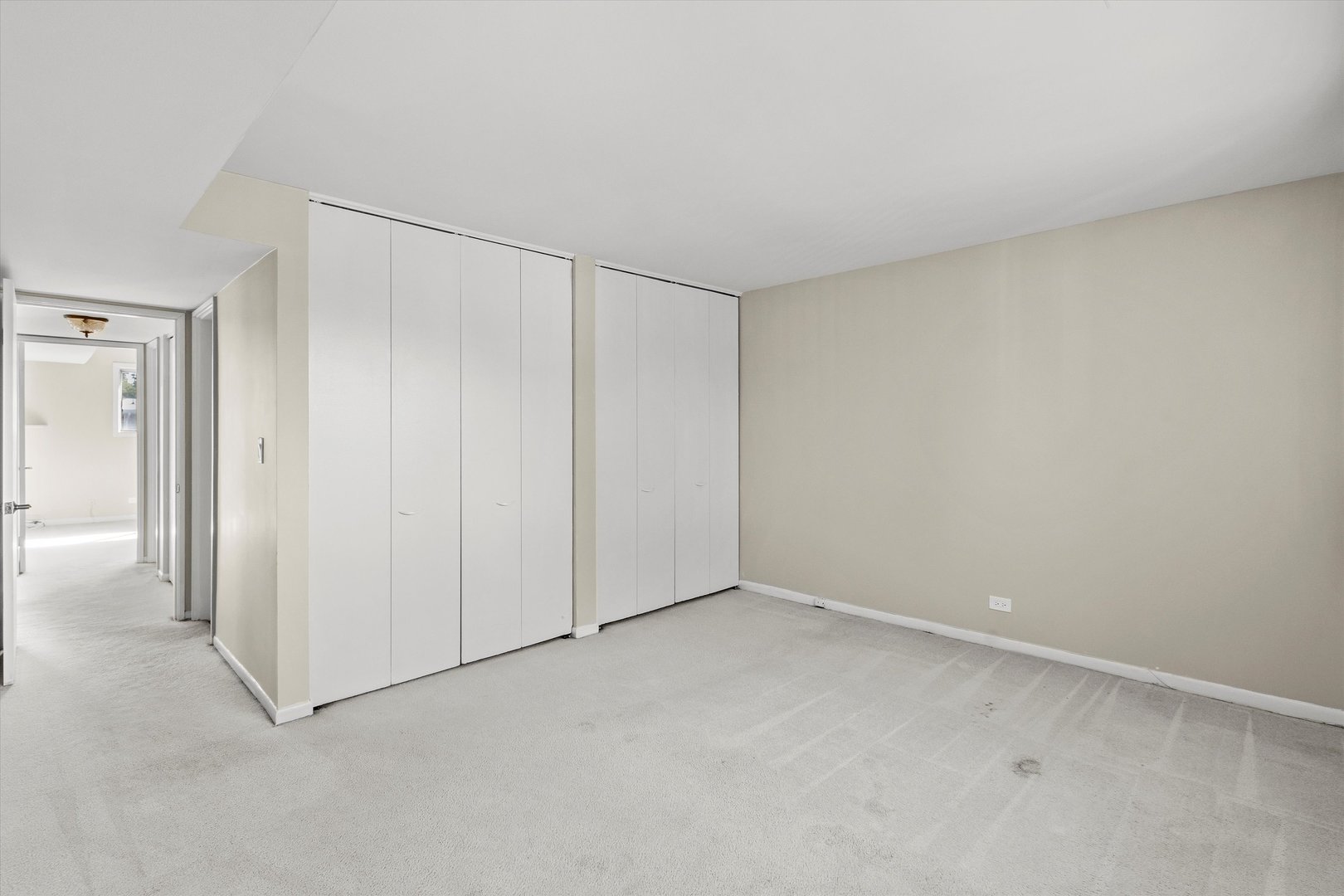 10124 Peach Parkway, Unit 208 Skokie, IL 60076 - Photo 21 of 38 a view of an empty room