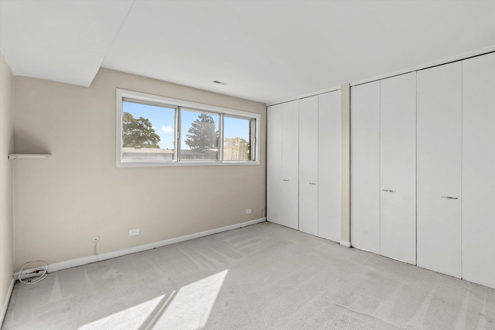 10124 Peach Parkway, Unit 208 Skokie, IL 60076 - Photo 23 of 38 a view of an empty room with closet area