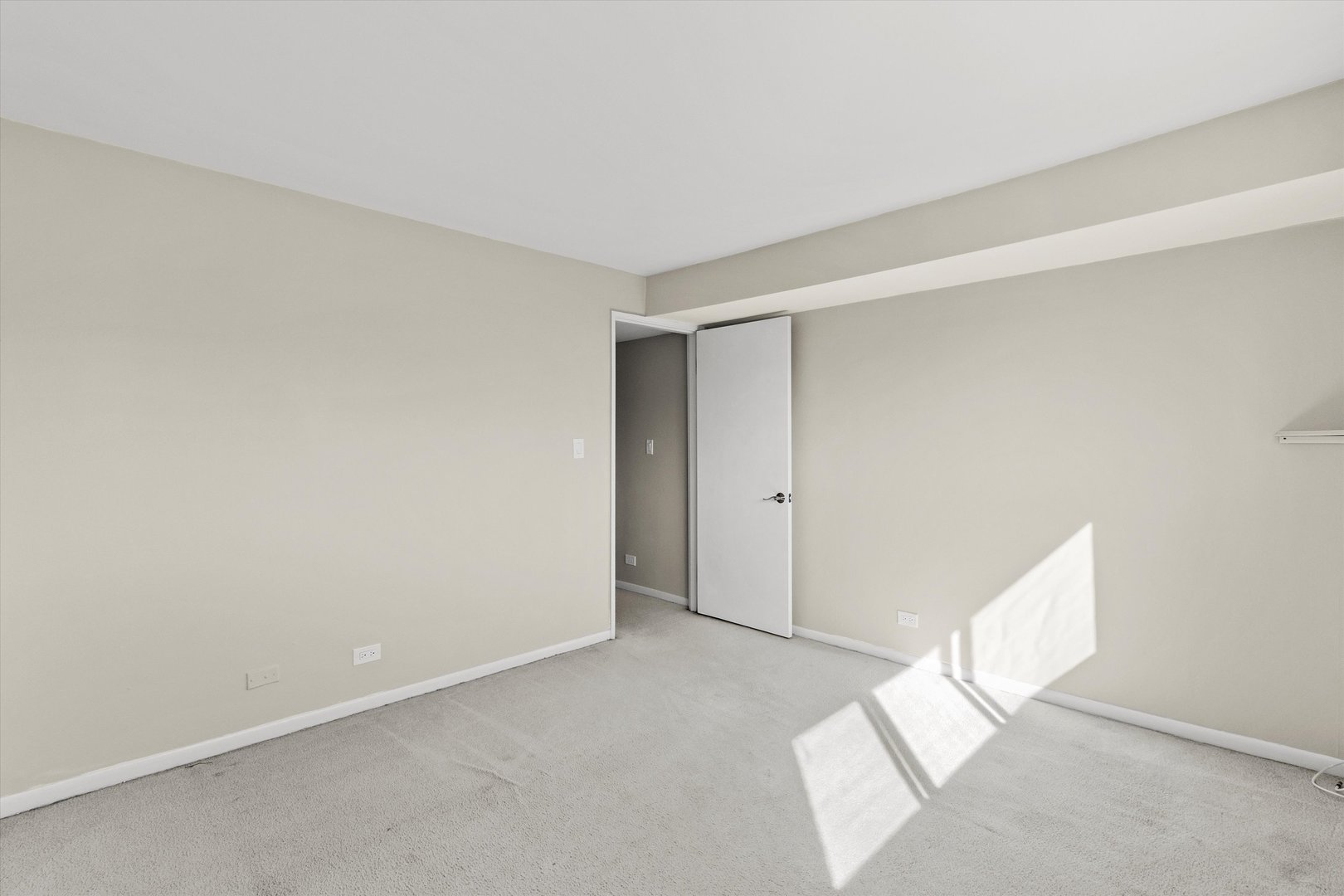 10124 Peach Parkway, Unit 208 Skokie, IL 60076 - Photo 27 of 38 a view of an empty room