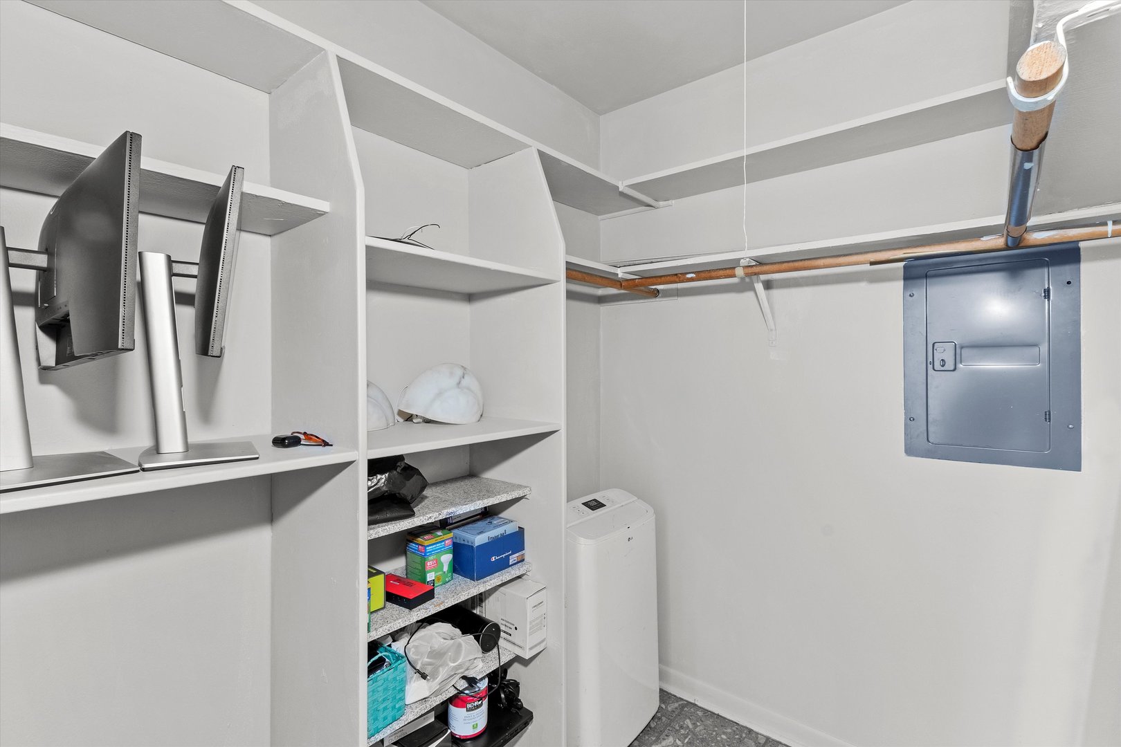 10124 Peach Parkway, Unit 208 Skokie, IL 60076 - Photo 28 of 38 a view of walk in closet with clothes and shoes