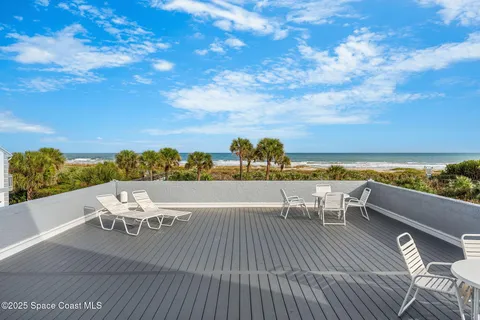 a view of a terrace with seating space