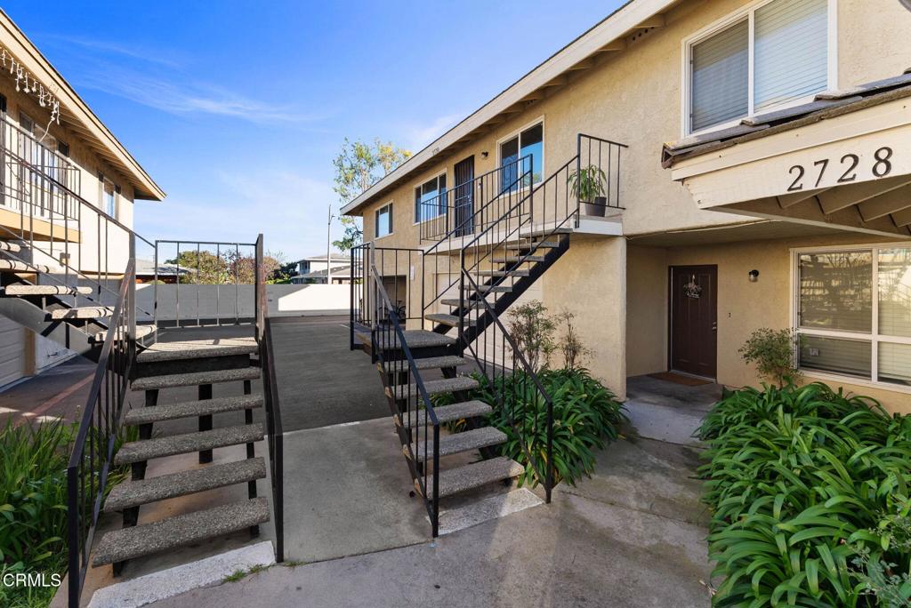 2730 Jill Place Port Hueneme, CA 93041 - Photo 3 of 25 a view of a house with couches and potted plants