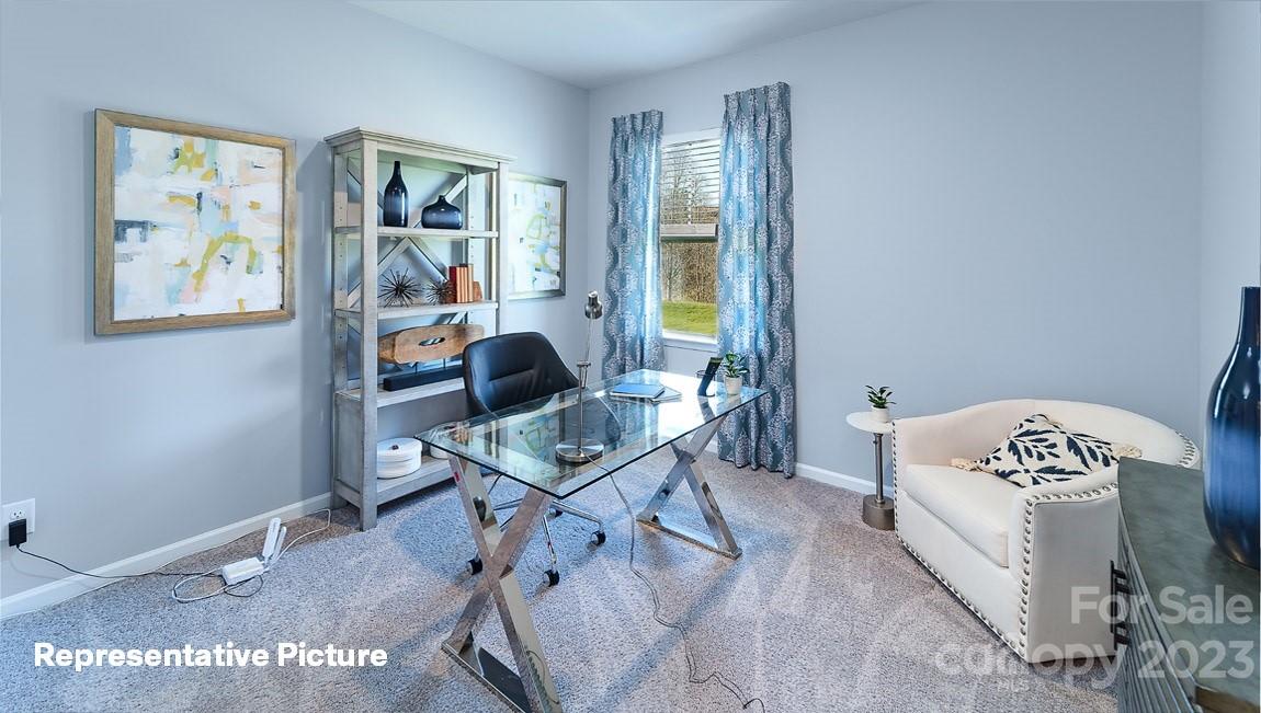 3791 Charles Street Northwest Conover, NC 28613 - Photo 19 of 32 a workspace with furniture and window