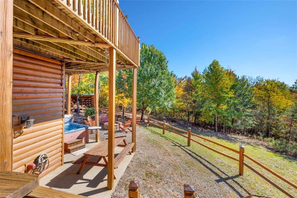 192 Oak Ridge Way Morganton, GA 30560 - Photo 29 of 56 a view of a balcony with chairs