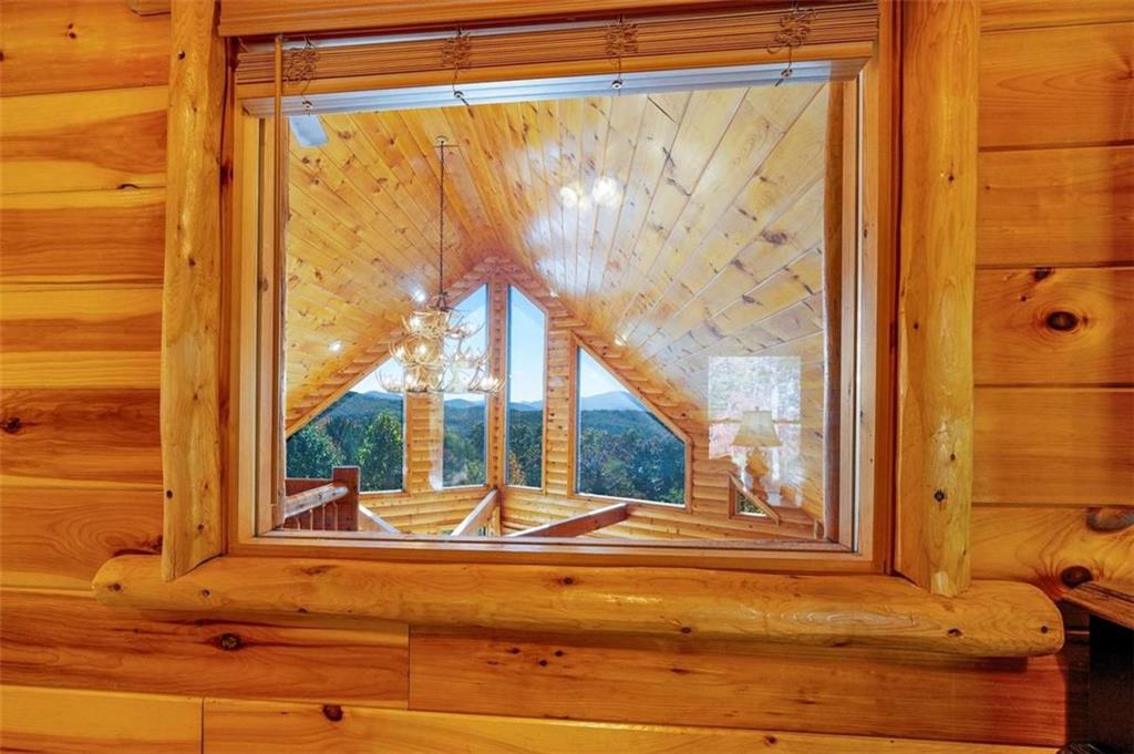 192 Oak Ridge Way Morganton, GA 30560 - Photo 31 of 56 a view of a glass door with a lake view and a window