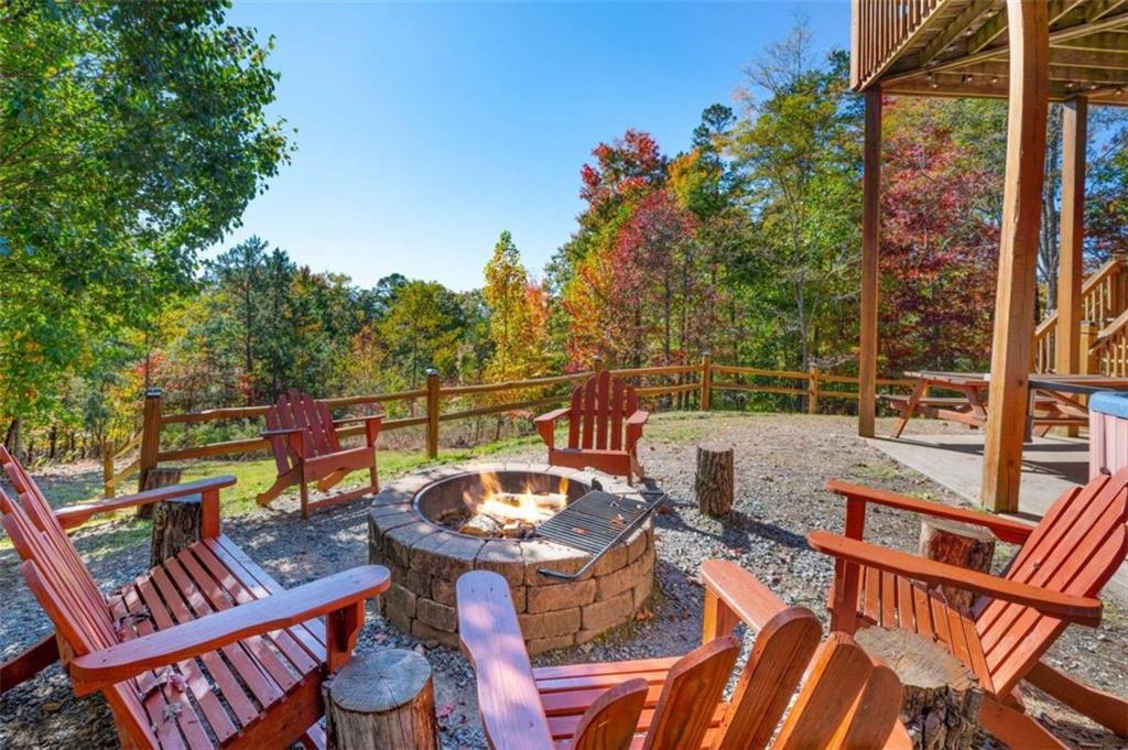 192 Oak Ridge Way Morganton, GA 30560 - Photo 55 of 56 a view of a chairs and table on the deck