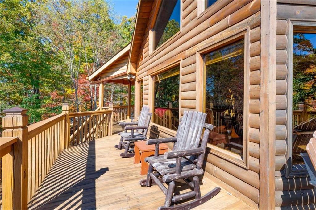 192 Oak Ridge Way Morganton, GA 30560 - Photo 8 of 56 a view of balcony with chairs and wooden fence