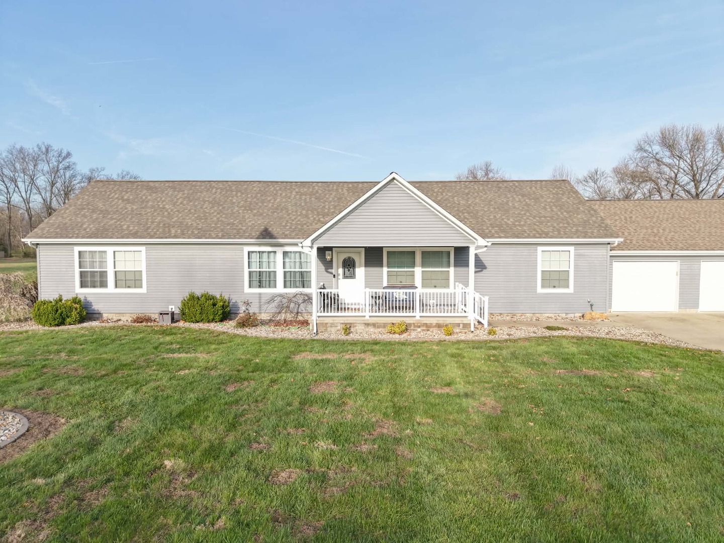513 North 10th Street Benton, IL 62812 - Photo 1 of 75 a front view of a house with a yard