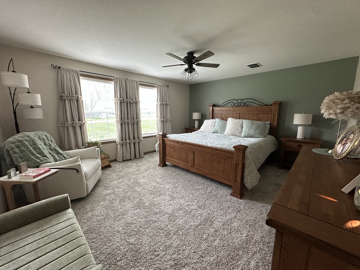 513 North 10th Street Benton, IL 62812 - Photo 30 of 75 a spacious bedroom with a bed and glass window