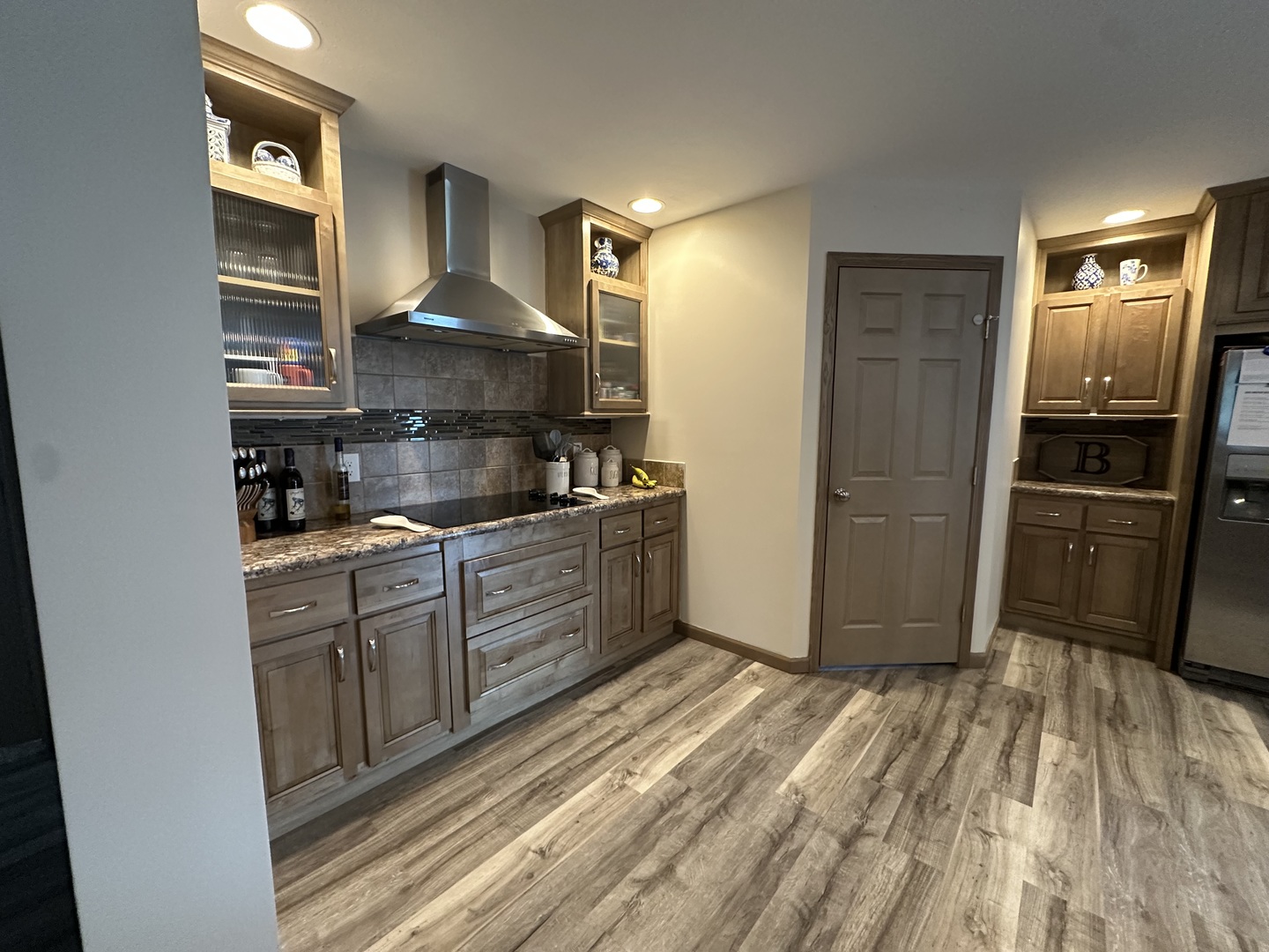 513 North 10th Street Benton, IL 62812 - Photo 43 of 75 a kitchen with granite countertop a refrigerator and a sink