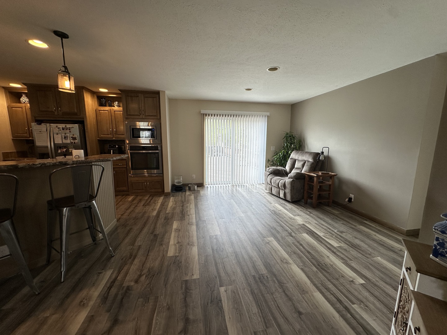 513 North 10th Street Benton, IL 62812 - Photo 54 of 75 a view of a living room a dining room wooden floor and a window